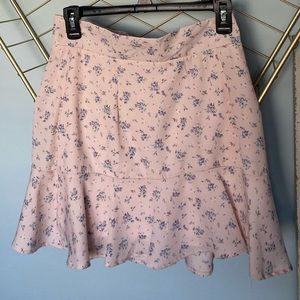 Altar’d State light pink and floral print crop skirt. Size medium.